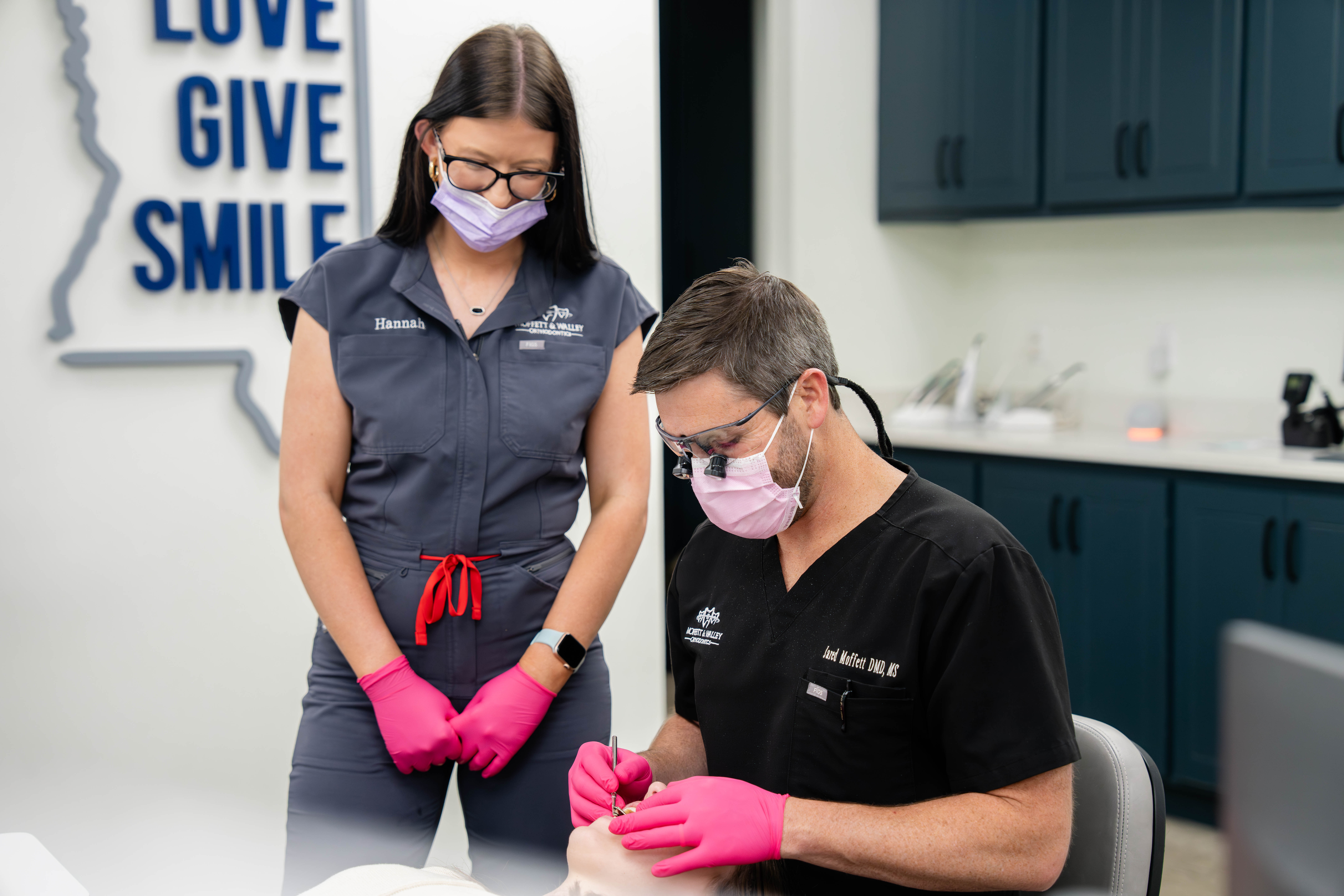 adult patient with doctor during visit